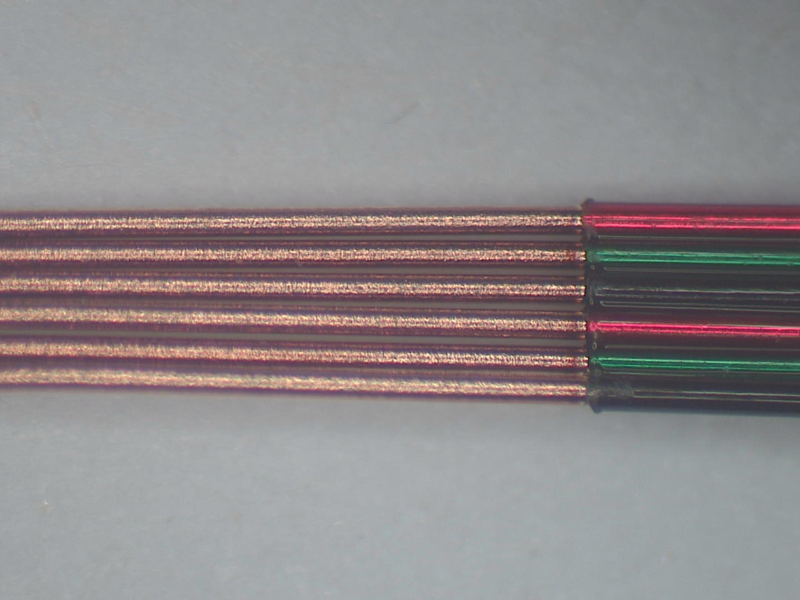 Micro fine medical wire processed using the Odyssey series of laser wire stripping machines-ribbonised