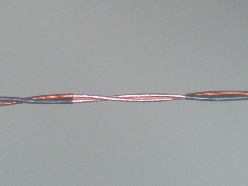 Micro fine medical wire processed using the Odyssey series of laser wire stripping machines-twisted pair