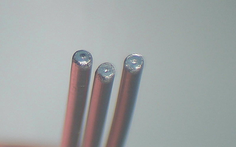 Stainless steel rigid coax. PTFE dielectric. 1.19mm OD-unprocessed 1433 G4E Stainless steel rigid coax. PTFE dielectric. 1.19mm OD processed with the Gemini-4E